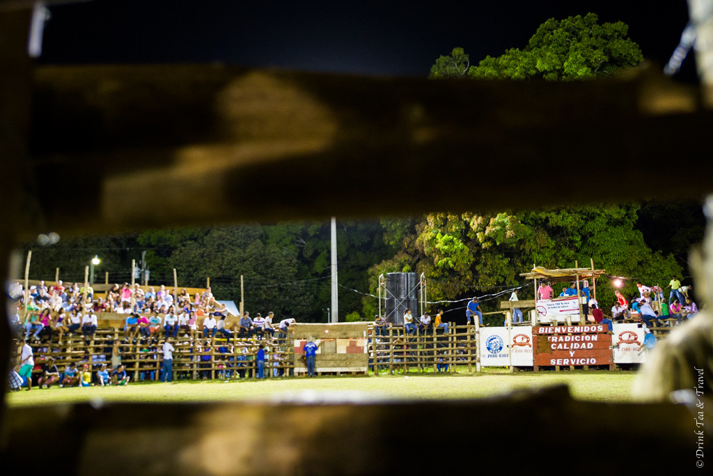 The view of the bull riding ring from behind the fence.